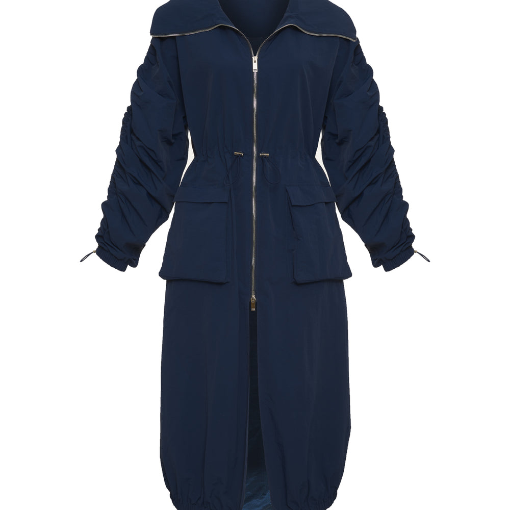 navy dark blue mid-length nylon trench jacket. fold over collar, two-way zip closure, bungee cinch at the waist, hem, two front pockets, two side seam pockets.