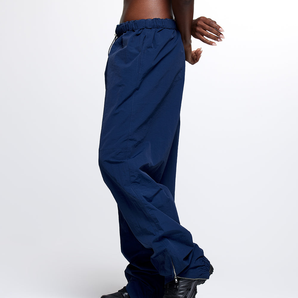 navy dark blue nylon cargo style track pants elastic waist zip cuffs