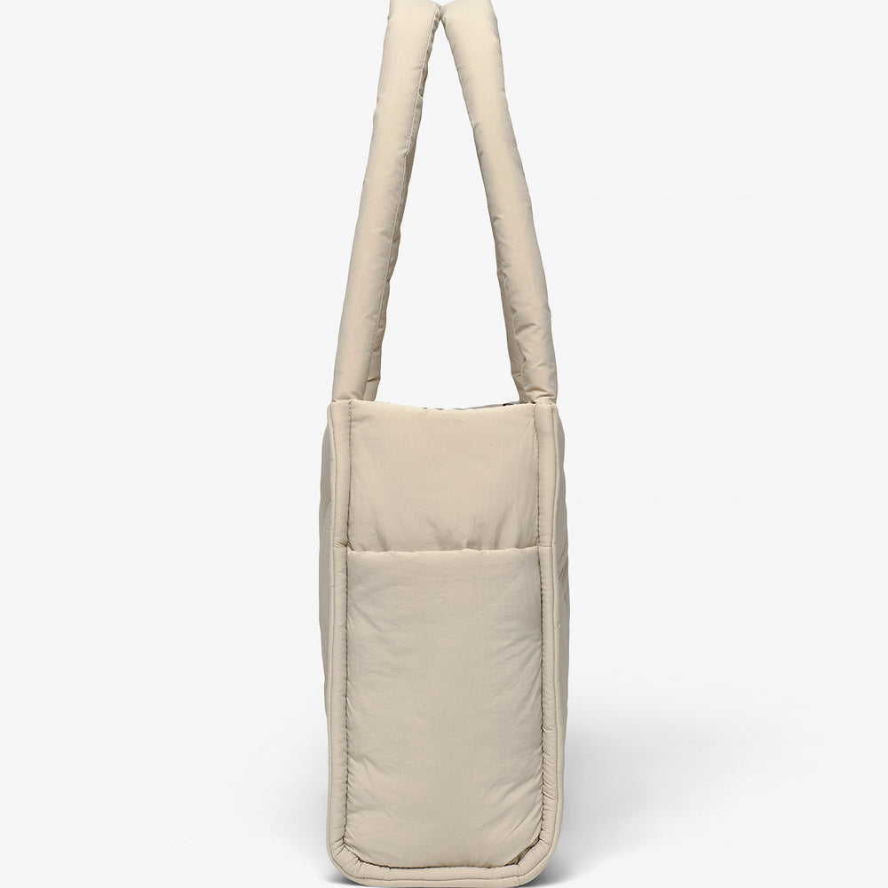 
                  
                    PEBBLE PUFFY TOTE SIDE
                  
                