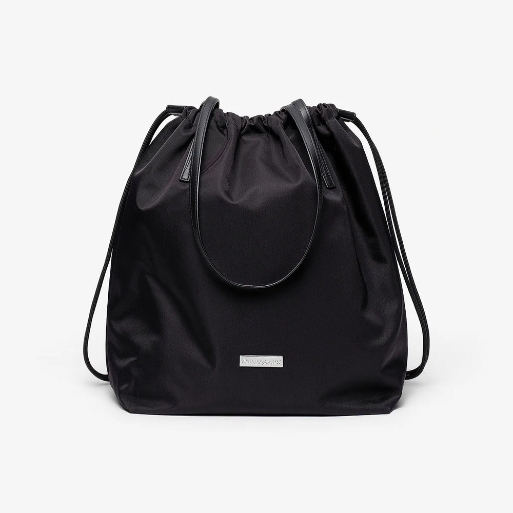 
                  
                    A black nylon shoulder bag
                  
                