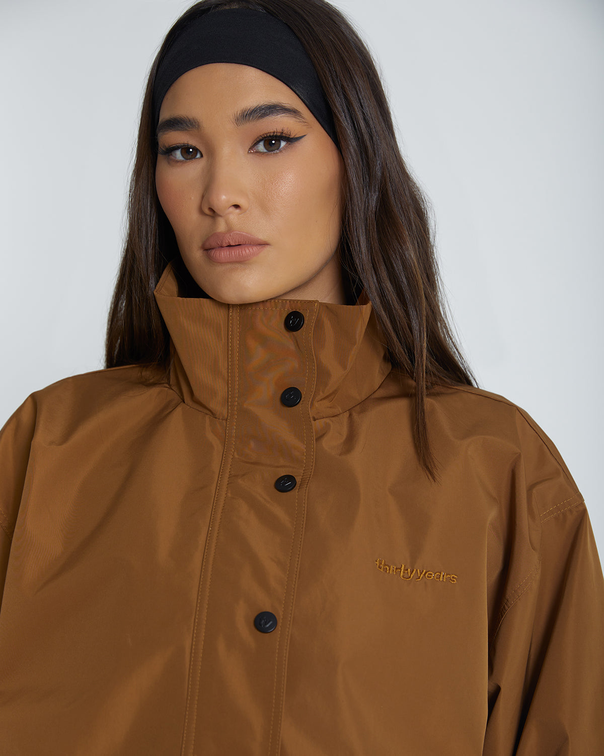 
                  
                    brown windbreaker element jacket camel
                  
                